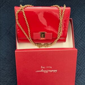 Authentic Salvatore Ferragamo Red Patent Leather Clutch with Gold Chain